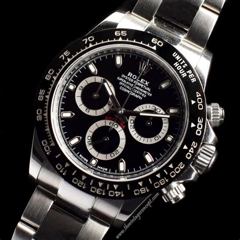 vintage rolex gold daytona black bezel|Rolex daytona platinum diamond dial.